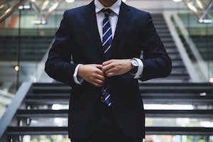 Photo of a business man in a suit.